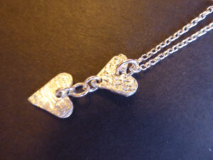 Twin heart pendant
