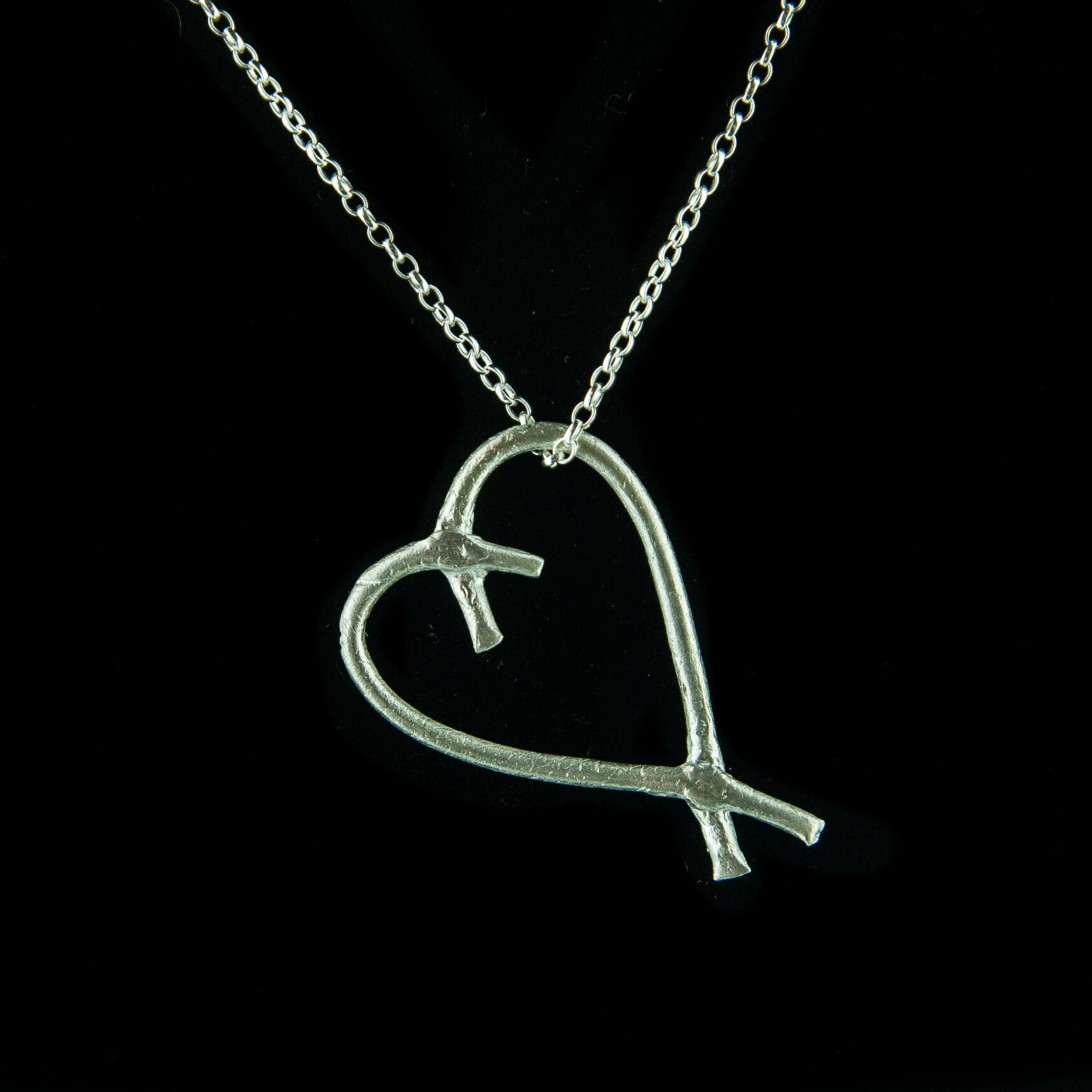 Contemporary silver heart pendant