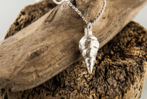 Tiny Conch Shell in Silver